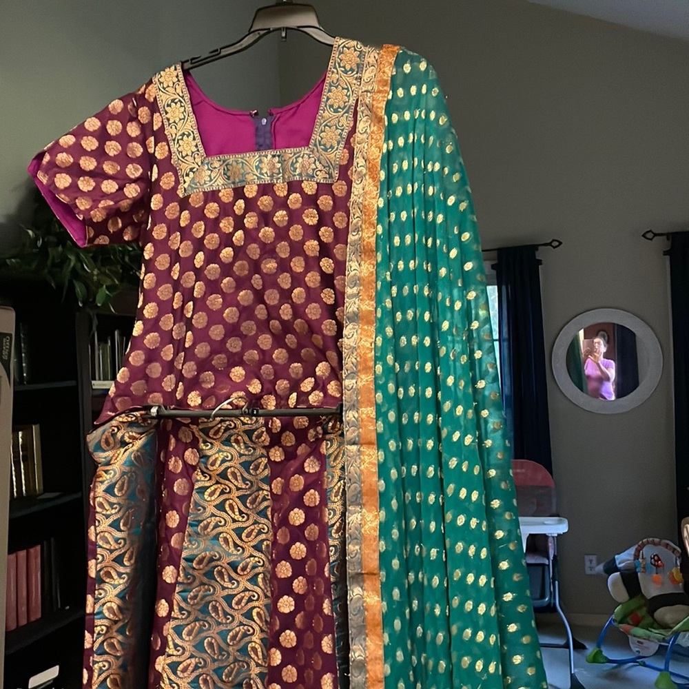 Gagara set chanderi design with rich gold work. Worn twice. Size large